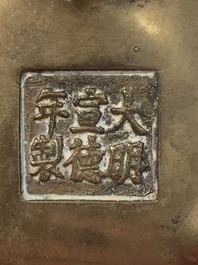 A Chinese bronze tripod censer with two handles, Xuande mark, 19th C.