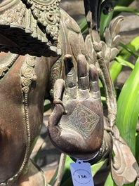 A very large Nepalese bronze sculpture of Manjusri, 19/20th C.
