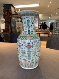 A pair of Chinese Nanking famille verte crackle-glazed vases, a famille rose vase and a blue and white celadon-ground vase, Chenghua mark, 19th C.