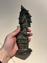 A Khmer bronze figure of Buddha Mucilinda, Angkor period, 12/13th C.