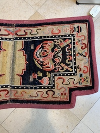 Two Tibetan saddle rugs with dragons and phoenixes, 19th C.