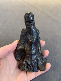 A Chinese burlwood figure of Shoulao and a boxwood group of five sages and a servant, Mugong 木公 mark, 19/20th C.