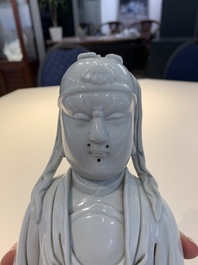 A Chinese Dehua blanc de Chine figure of Wenchang, 20th C.