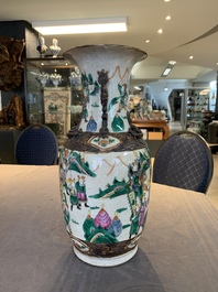 Seven Chinese Nanking blue and white and famille verte crackle-glazed vases, 19/20th C.