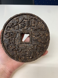Seven Chinese Pu'er tea and black tea bricks, 20th C.