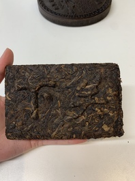 Seven Chinese Pu'er tea and black tea bricks, 20th C.
