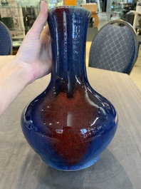 A Chinese flamb&eacute;-glazed bottle vase, 19th C.