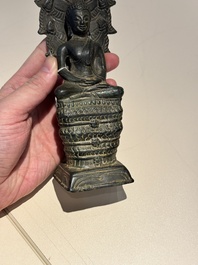 A Khmer bronze figure of Buddha Mucilinda, Angkor period, 12/13th C.