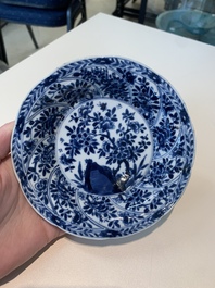 18 Chinese blue and white cups and 16 saucers with floral design, jade mark, Kangxi