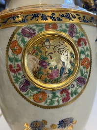 A pair of Chinese export famille rose urns and covers, Qianlong