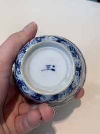 18 Chinese blue and white cups and 16 saucers with floral design, jade mark, Kangxi
