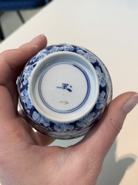 18 Chinese blue and white cups and 16 saucers with floral design, jade mark, Kangxi