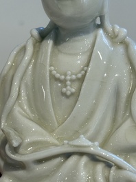 Two Chinese Dehua blanc de Chine figures of Guanyin and Shoulao and a pair of Buddhist lions, He Chaozong 何朝宗 mark, 18/19th C.