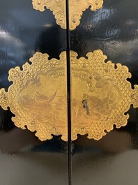 A rare Japanese black-lacquered cabinet with finely engraved gilt mounts, Edo, late 17th C.