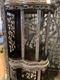 A richly carved Chinese hongmu display cabinet, Canton, 19th C.