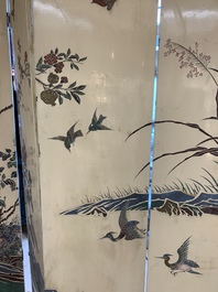 A Chinese polychrome lacquered wooden eight-panel folding screen with a pond scene, 19/20th C.