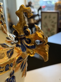 A pair of Chinese export famille rose urns and covers, Qianlong