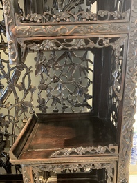 A richly carved Chinese hongmu display cabinet, Canton, 19th C.