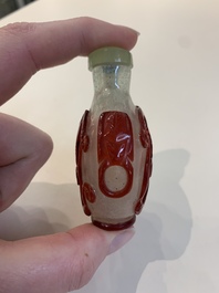 A collection of 14 Peking glass snuff bottles, 19/20th C.