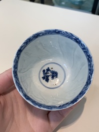18 Chinese blue and white cups and 16 saucers with floral design, jade mark, Kangxi