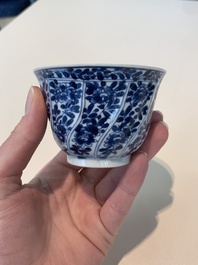 18 Chinese blue and white cups and 16 saucers with floral design, jade mark, Kangxi