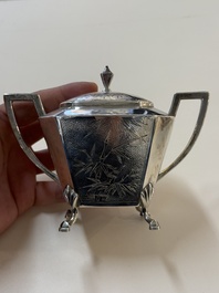 A Chinese silver covered teapot, sugar jar and milk jug with bamboo design, Tackhing 90% silver mark, 20th C.