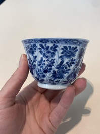 18 Chinese blue and white cups and 16 saucers with floral design, jade mark, Kangxi