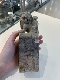 Two Chinese snuff bottles, four soapstone seals and a lacquer covered box, 20th C.