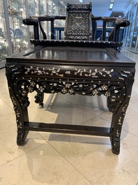 A Chinese mother-of-pearl-inlaid hongmu reclining armchair with a retractable footrest, Canton, 19th C.