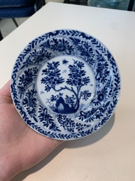 18 Chinese blue and white cups and 16 saucers with floral design, jade mark, Kangxi