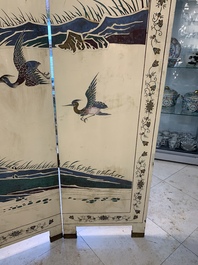 A Chinese polychrome lacquered wooden eight-panel folding screen with a pond scene, 19/20th C.