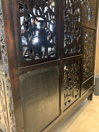 A richly carved Chinese hongmu display cabinet, Canton, 19th C.
