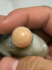 A collection of ten Chinese agate snuff bottles, 20th C.