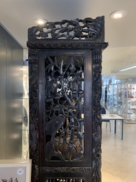 A richly carved Chinese hongmu display cabinet, Canton, 19th C.