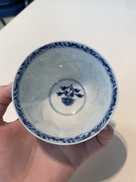 18 Chinese blue and white cups and 16 saucers with floral design, jade mark, Kangxi