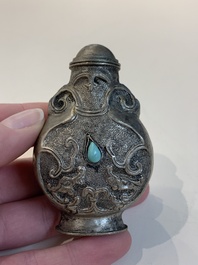 Two Chinese snuff bottles, four soapstone seals and a lacquer covered box, 20th C.