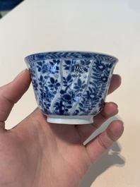 18 Chinese blue and white cups and 16 saucers with floral design, jade mark, Kangxi