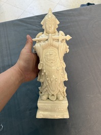 Three Chinese Dehua blanc de Chine figures of Guanyin and Weituo, He Chaozong 何朝宗 and Dehua 德化 mark, 20th C.