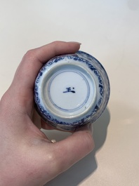 18 Chinese blue and white cups and 16 saucers with floral design, jade mark, Kangxi