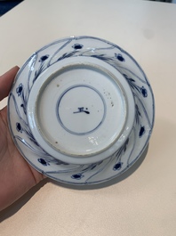 18 Chinese blue and white cups and 16 saucers with floral design, jade mark, Kangxi