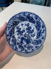 18 Chinese blue and white cups and 16 saucers with floral design, jade mark, Kangxi
