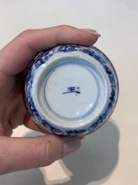 18 Chinese blue and white cups and 16 saucers with floral design, jade mark, Kangxi