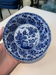 18 Chinese blue and white cups and 16 saucers with floral design, jade mark, Kangxi