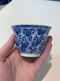 18 Chinese blue and white cups and 16 saucers with floral design, jade mark, Kangxi