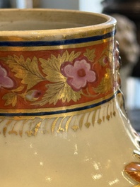 A pair of Chinese export famille rose urns and covers, Qianlong