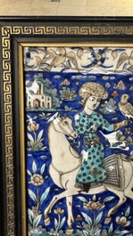 A rectangular Qajar relief-moulded tile with a prince on horseback, Iran, 19th C.