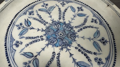 A blue, white and turquoise Iznik pottery dish with floral design, Turkey, late 16th C.
