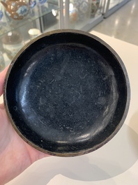 Two Chinese snuff bottles, four soapstone seals and a lacquer covered box, 20th C.