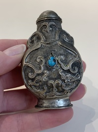 Two Chinese snuff bottles, four soapstone seals and a lacquer covered box, 20th C.