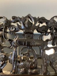A richly carved Chinese hongmu display cabinet, Canton, 19th C.